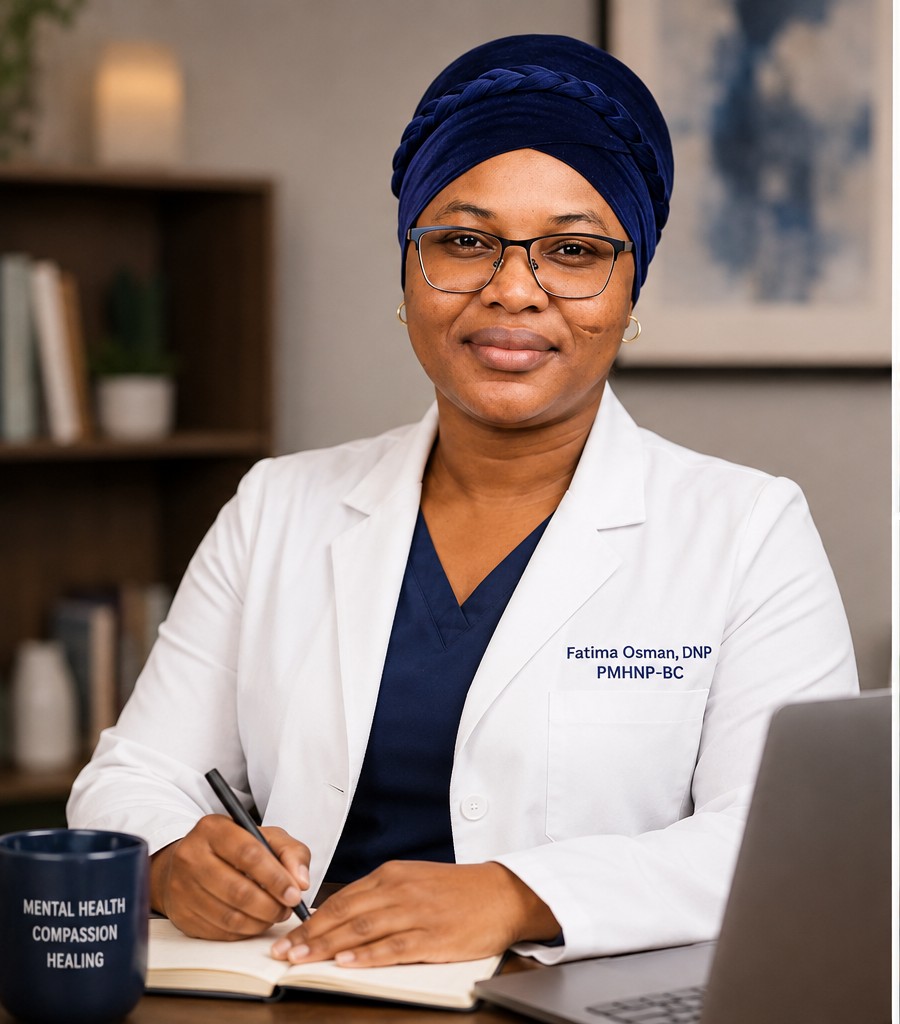Fatima Osman, PMHNP-BC, DNP writing notes at her desk